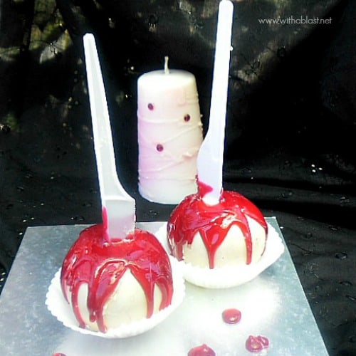 Blood Oozing Chocolate Apples ~ These Apples will have your guests raving for more ! Chocolate covered and drizzled with a quick homemade Hard-Candy {no thermometer needed} #Halloween #CandyApple www.WithABlast.net