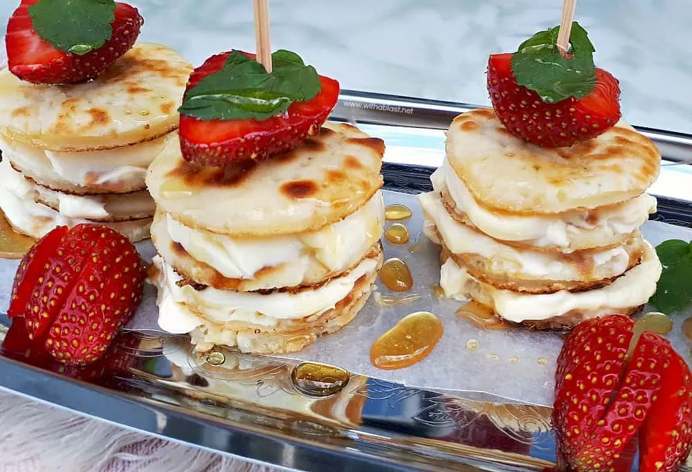 https://www.withablast.net/wp-content/uploads/2019/02/Mascarpone-Filled-Mini-Pancake-Stacks-a.jpg.webp